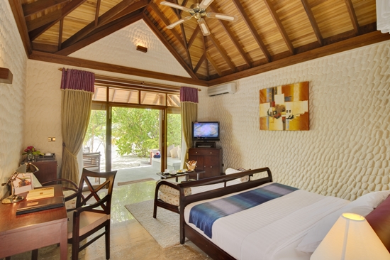 Olhuveli Malediwy Beach Villa - przykładowy pokój